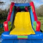 A 45ft velcro themed obstacle course slide view