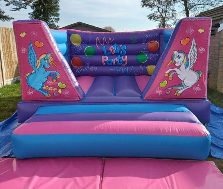 Unicorn 8ft velcro bouncy castle hire Essex