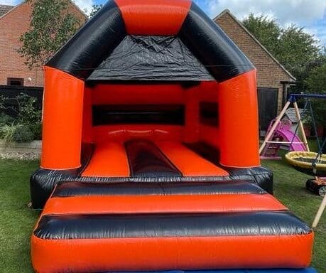 Shiny Orange & Black Bouncy Castle