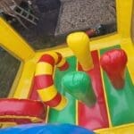 A multi coloured activity castle inside view