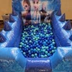 Frozen 2 themed inflatable ball pool with air jugglers and balls, available for hire in Essex.