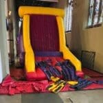 An Inflatable Velcro Fly Wall with Velcro suits
