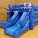 a frozen themed castle with slide side view