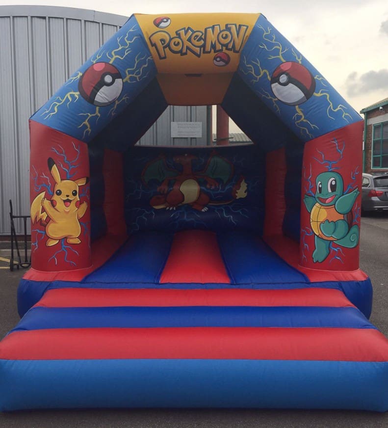 A Pokemon themed bouncy castle in a Red & Blue colour