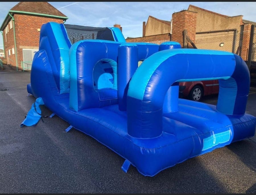 a shiny blue themed obstacle course