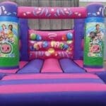 a cocomelon velcro style themed boincy castle