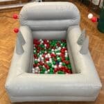 A silver inflatable ball pool