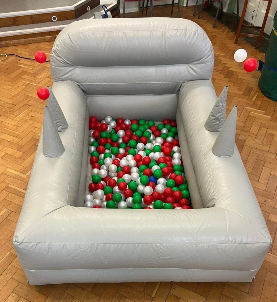 A silver inflatable ball pool